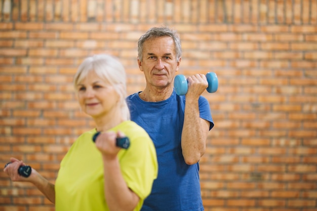 Elderly couple working out