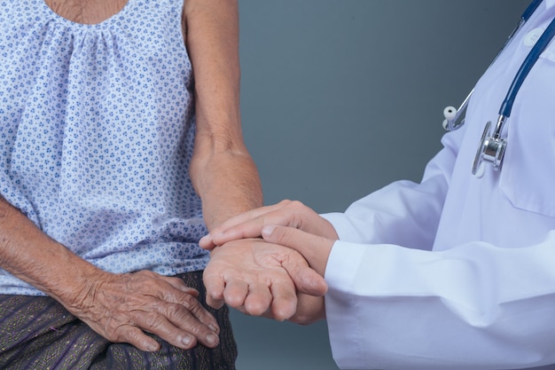 Elderly health check with young nurse.