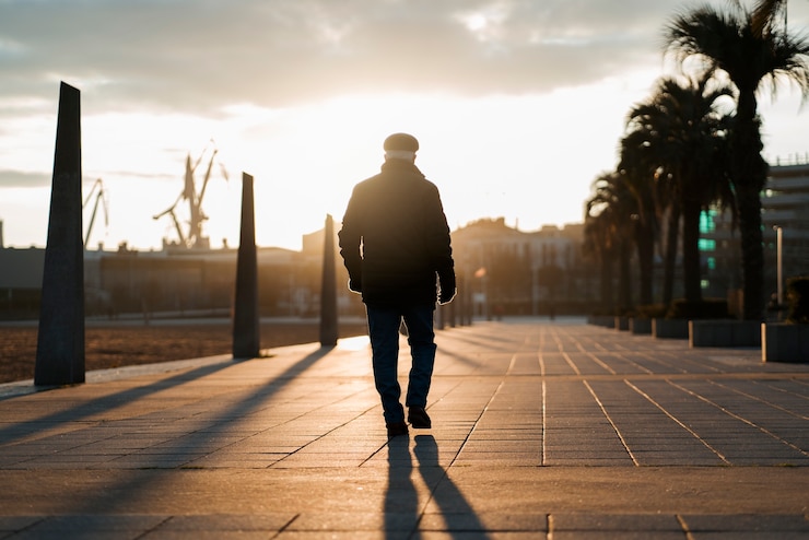 Free Photo elderly man taking a stroll