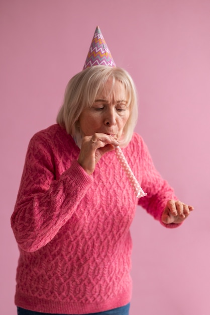 Free photo elderly person celebrating their birthday