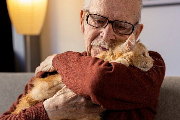 Elderly person with pet cat