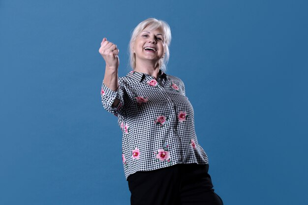 Elderly woman celebrating