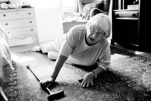 Free photo elderly woman fell on the floor