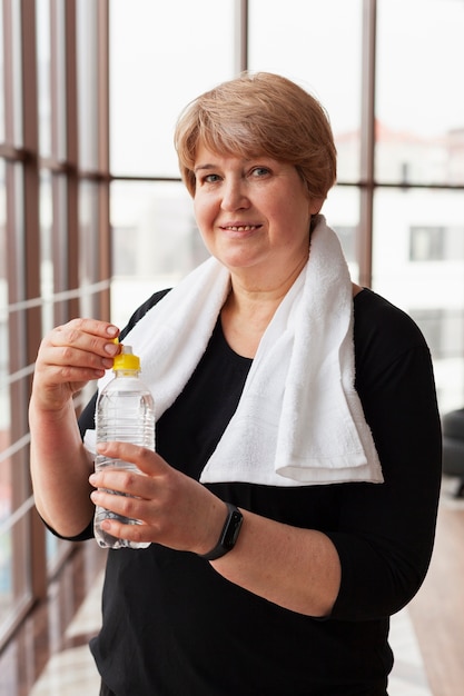 Elderly woman hydrating