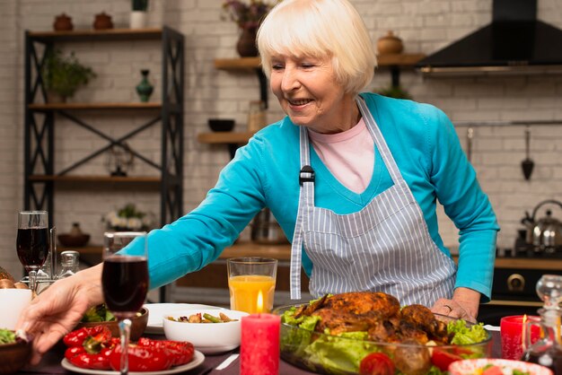 Elderly woman preparing the thanksgiving meal