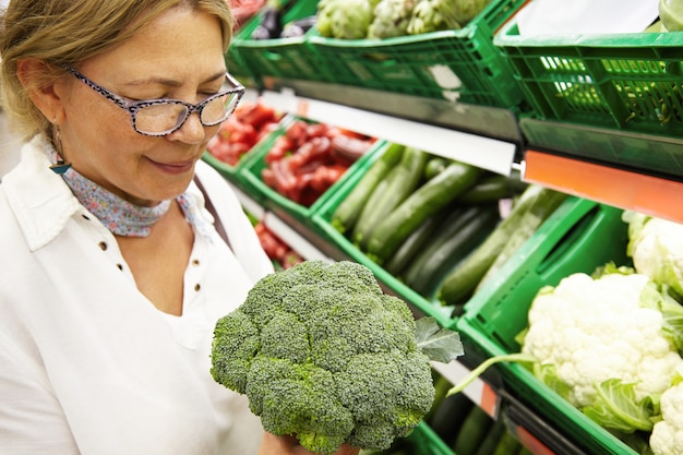 Elderly woman in supermarket