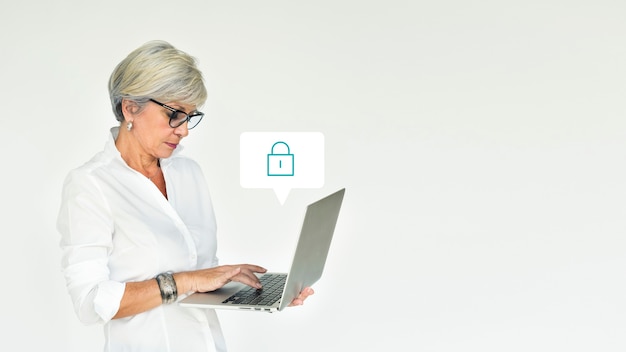 Elderly woman using a laptop