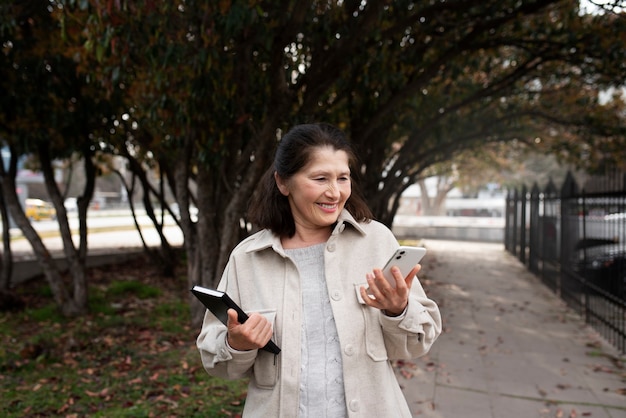 Elderly woman walking in the city