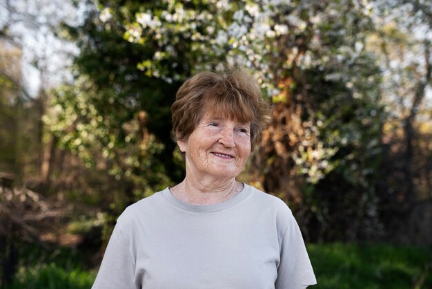 Elderly woman walking in park