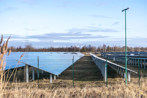 Free photo electric farm with panels for producing clean ecologic energy