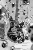 Free photo electric guitar in beautiful setting still life