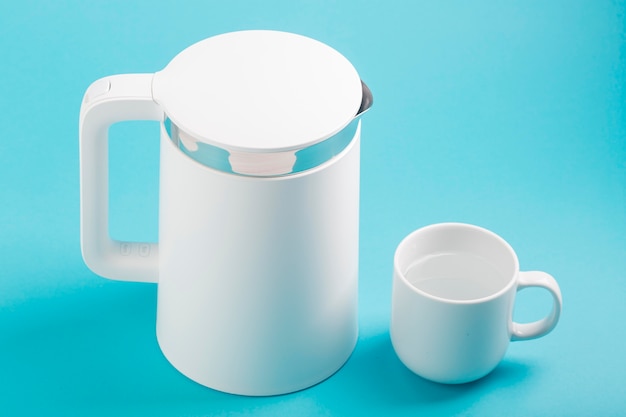 Electric kettle and cup high view