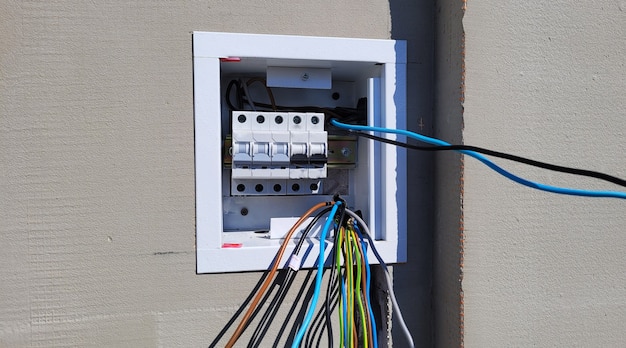 Electricity distribution box with wires and circuit breakers (fuse box)
