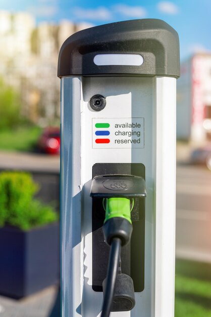 Electro car charger with two plugged in pistol