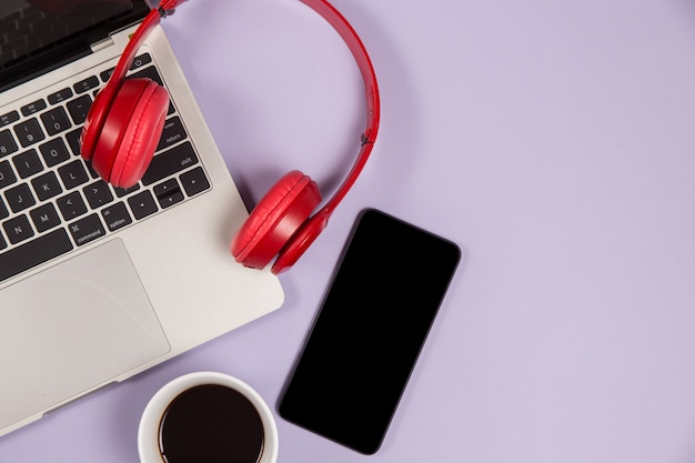Electronic devices to listen to music and a cup of coffee
