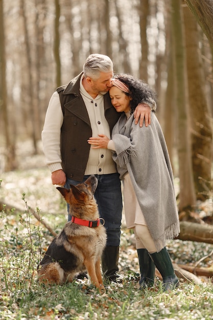 Elegant adult couple in a spring forest