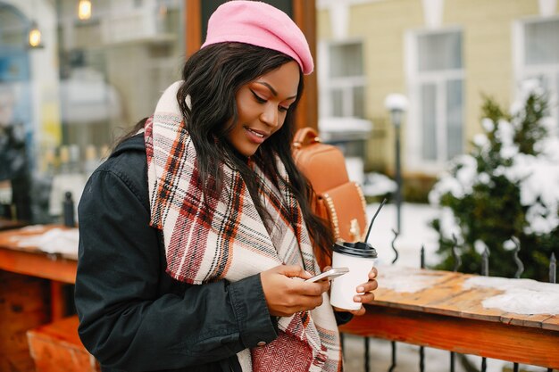 Elegant black girl in a winter city