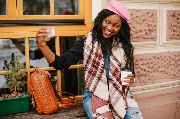 Elegant black girl in a winter city