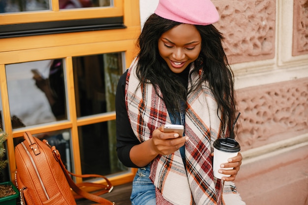 Elegant black girl in a winter city