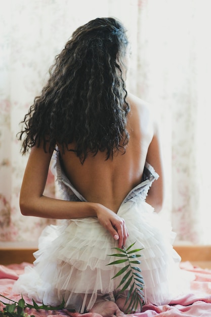 Elegant brunette with leaf