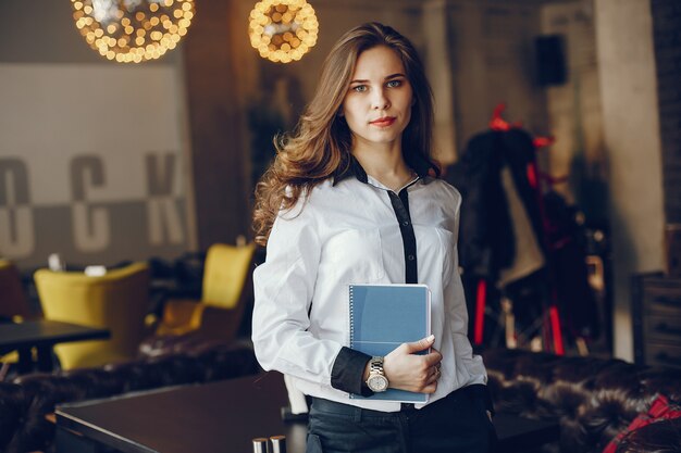 elegant business girl with notebook