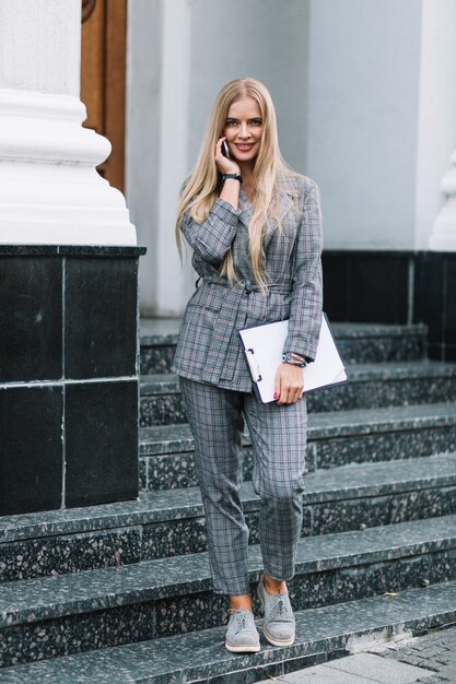 Elegant businesswoman making phone call