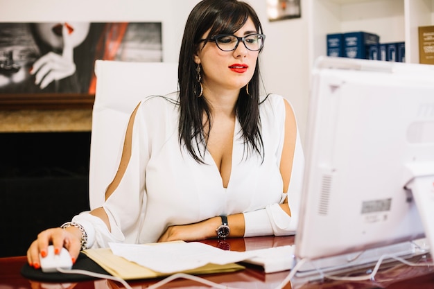 Elegant businesswoman working with computer