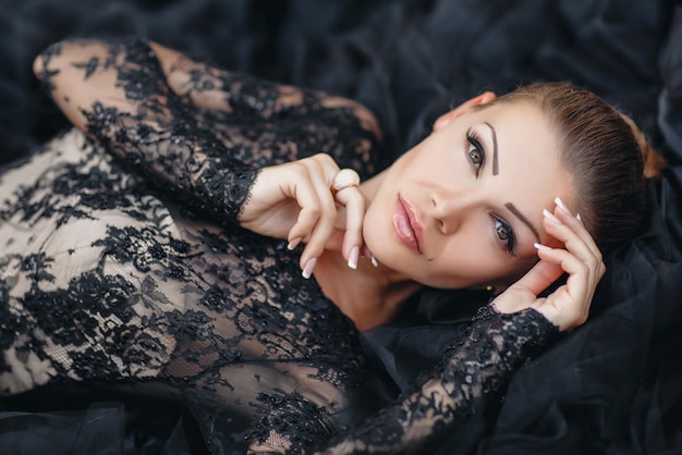 elegant closeup portrait of a young woman in luxury dress