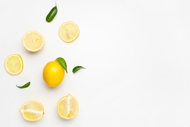 Elegant composition of set of lemons on a white surface