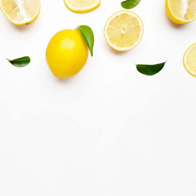 Elegant composition of set of lemons on a white surface