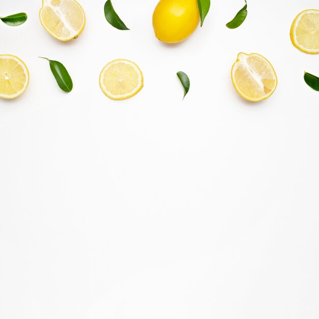 Elegant composition of set of lemons on a white surface