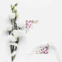 Free photo elegant cotton branches on table