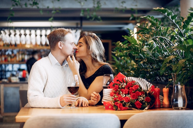 Elegant couple spend time in a restaurant