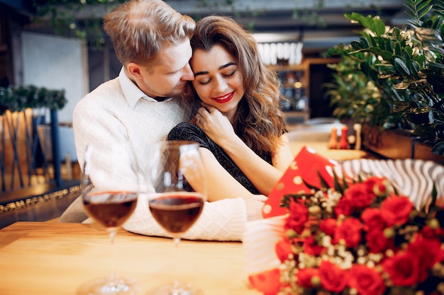 Elegant couple spend time in a restaurant