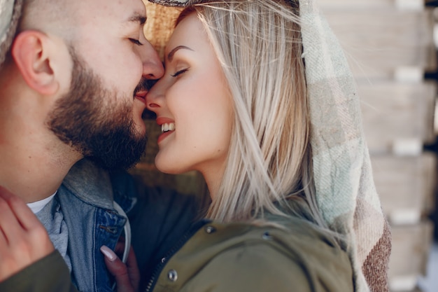 Elegant couple in a winter park