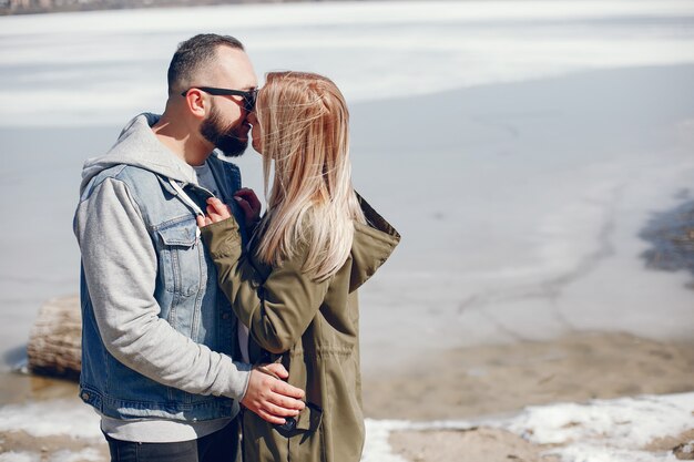 Elegant couple in a winter park