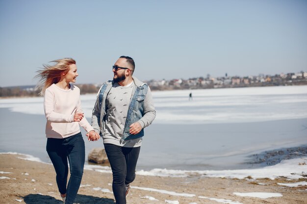 Elegant couple in a winter park