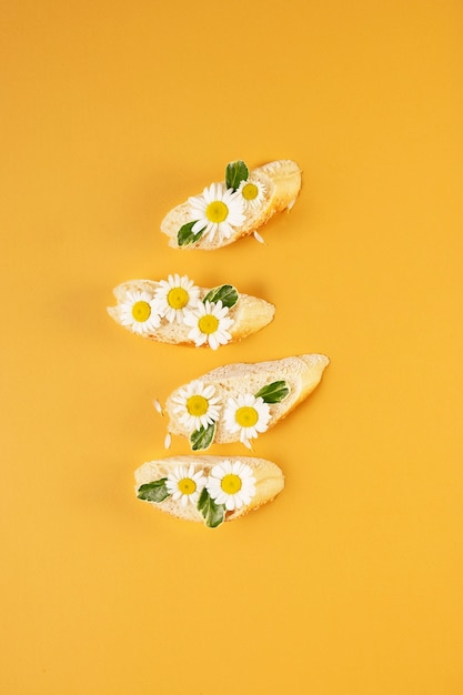 Elegant eco food concept with flowers on bread