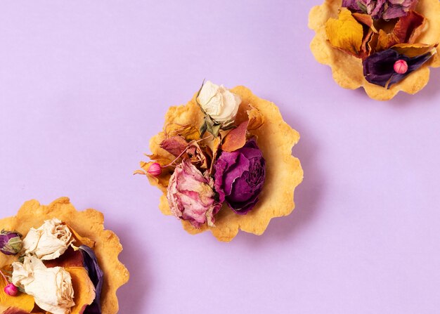 Elegant eco food concept with flowers in dessert tart