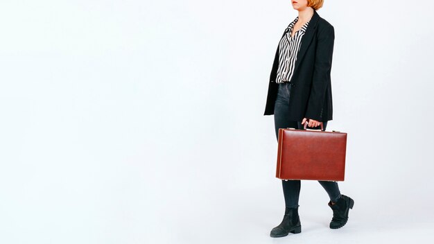 Elegant employee with briefcase