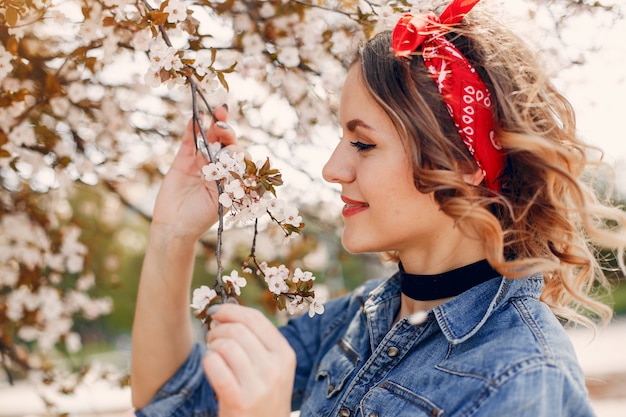 Elegant girl in a spring park