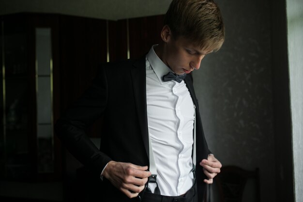 Elegant groom in suit