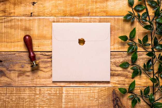 Elegant invitation on wood background