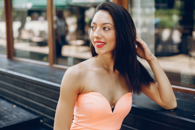 Free photo elegant lady in a pink dress