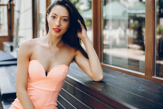 Elegant lady in a pink dress