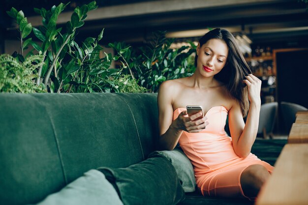 Elegant lady with mobile phone