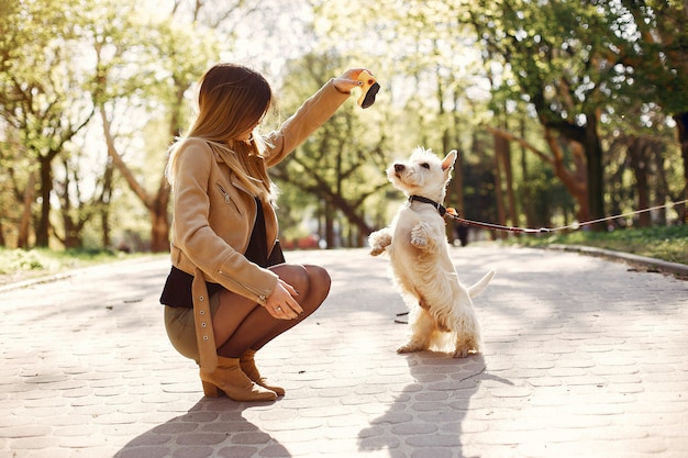 Elegant little girl in a spring park