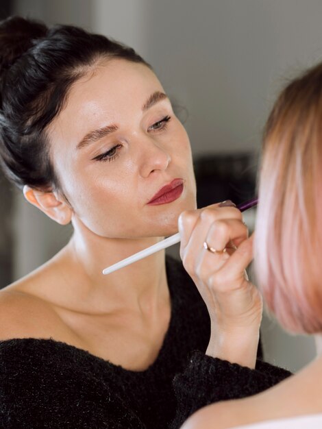 Elegant make up artist working