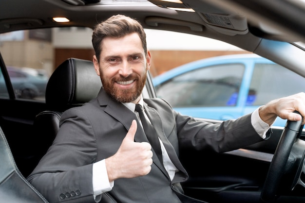 Elegant male taxi driver in costume