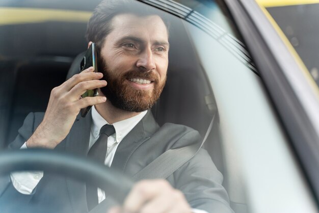 Elegant male taxi driver in costume